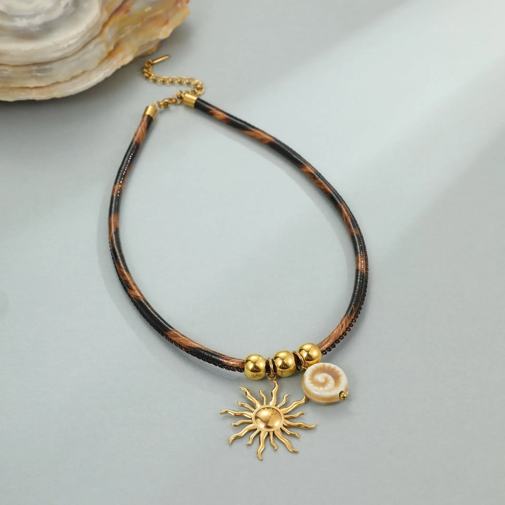 Geometric leopard pendant necklace on adjustable chain with 18K gold electroplated finish
