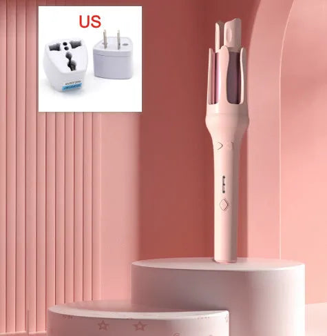 White and pink automatic hair curler with a 32mm ceramic barrel and a US plug adapter on a table.