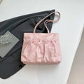 College style bow tote bag in PU leather with large capacity and internal zipper pocket organisation