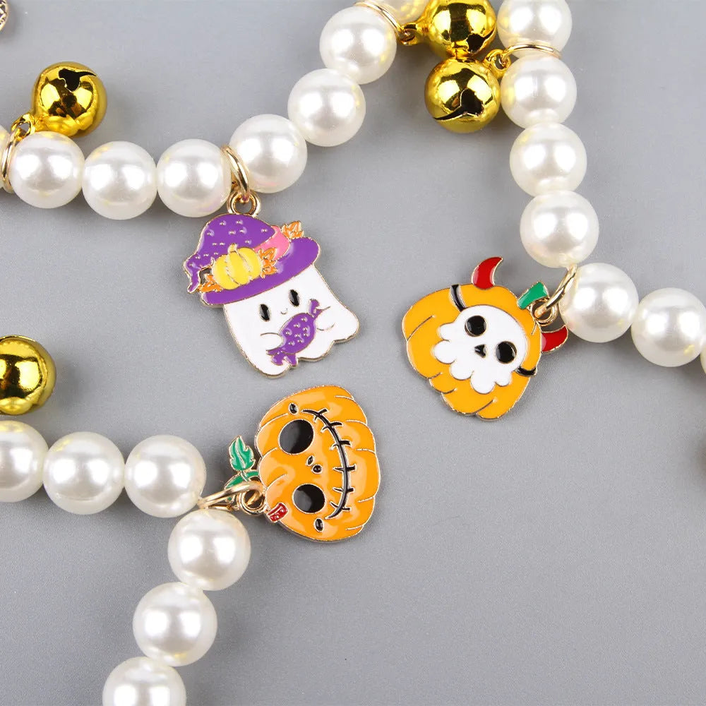 Halloween cat collar with simulated pearl necklace decoration in pumpkin-themed colours.