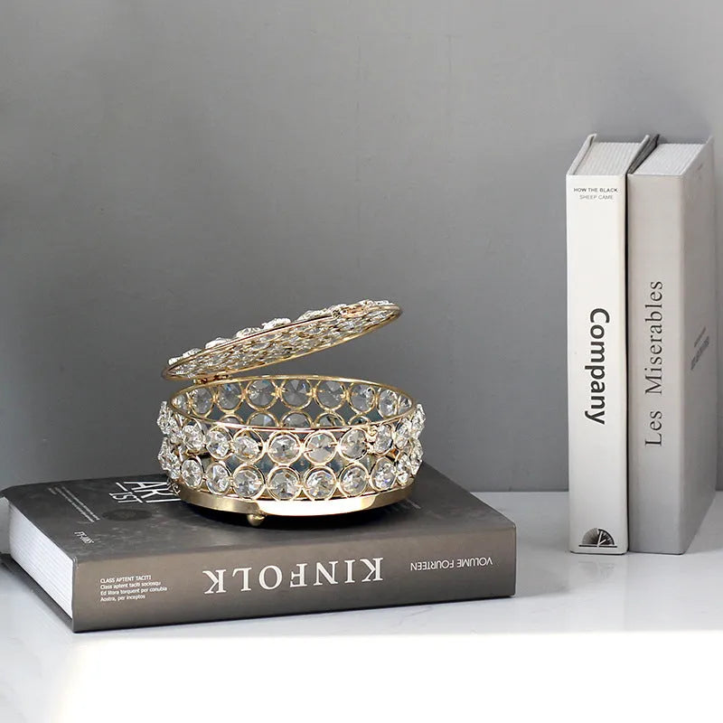 Crystal glass jewelry storage box with transparent sides and French gold metal frame