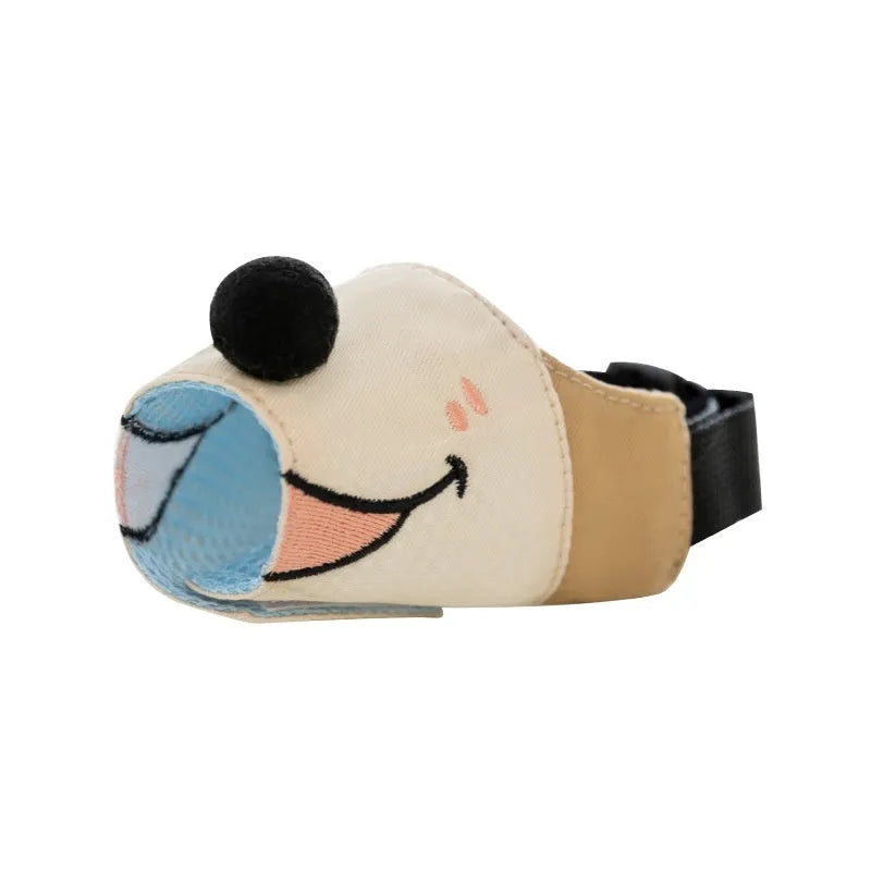 Canvas dog muzzle in Ollie Brown Bear colour with secure buckle, shown on a dog's snout.