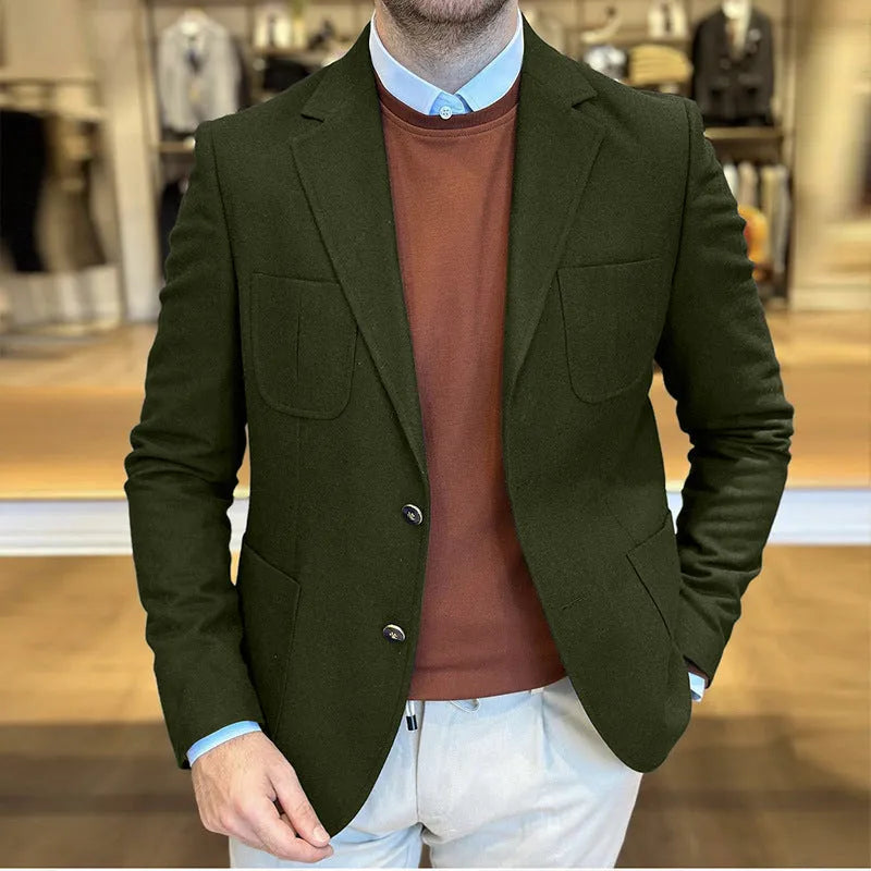 Man wearing a loose-fit army green cotton retro suit jacket, showing front and side details.