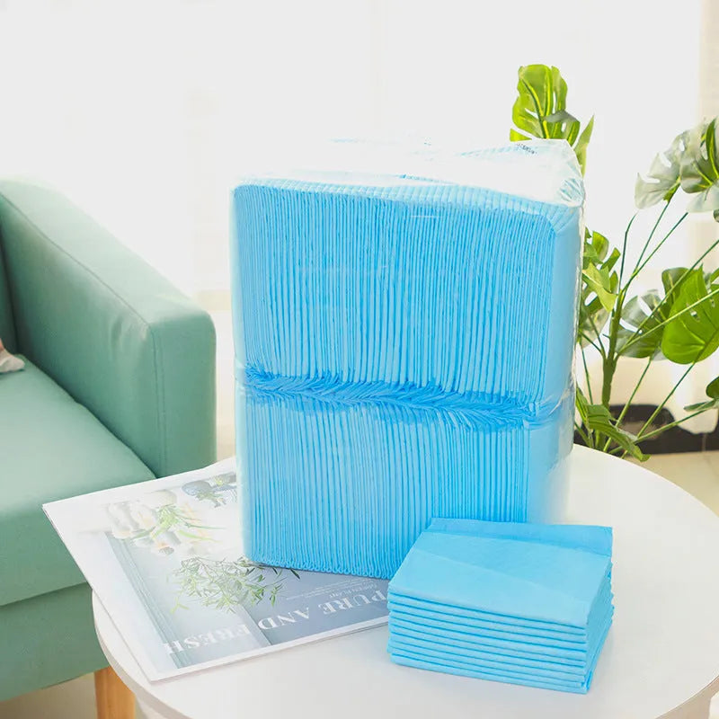 Pack of pet urinal pads showing bamboo charcoal deodorant variant in size L 60x60cm