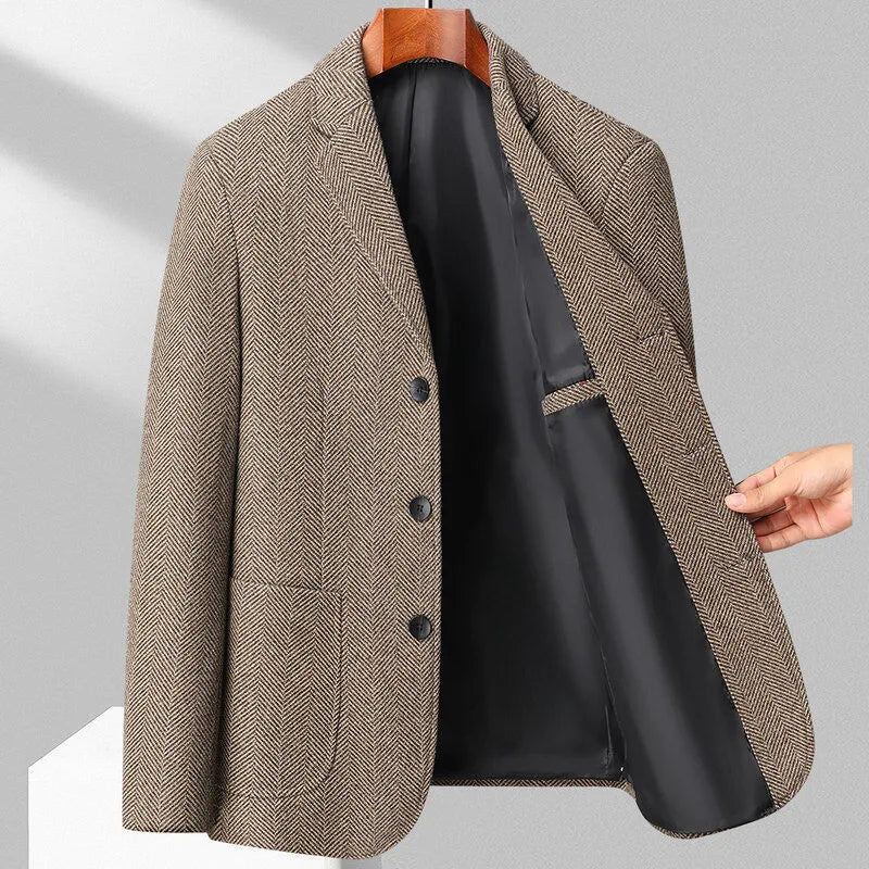 Man wearing a loose fit black casual coat for spring or autumn.