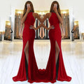 Long red knitting fabric evening dress with large swing skirt, high waist, hollow detail, and hanging neckline.