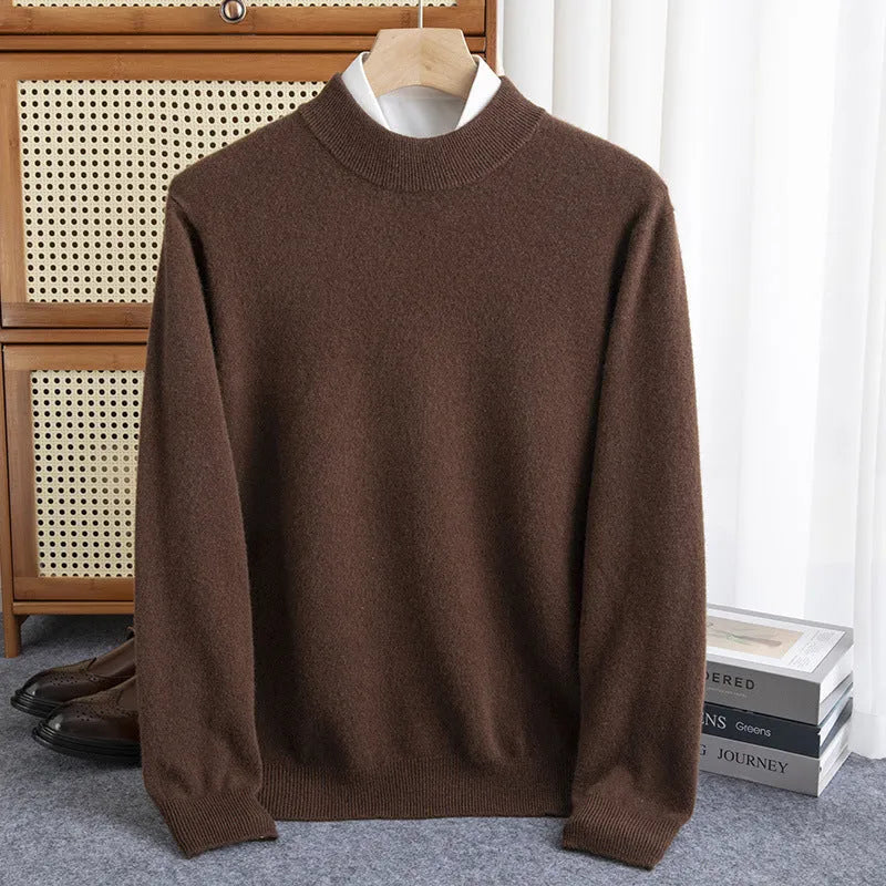 Man wearing a chunky knit half-turtleneck wool sweater in a loose fit.