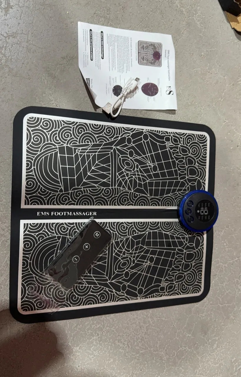 Micro-current foot massage cushion with wireless remote control and LCD display showing massage modes