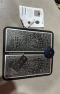 Micro-current foot massage cushion with wireless remote control and LCD display showing massage modes
