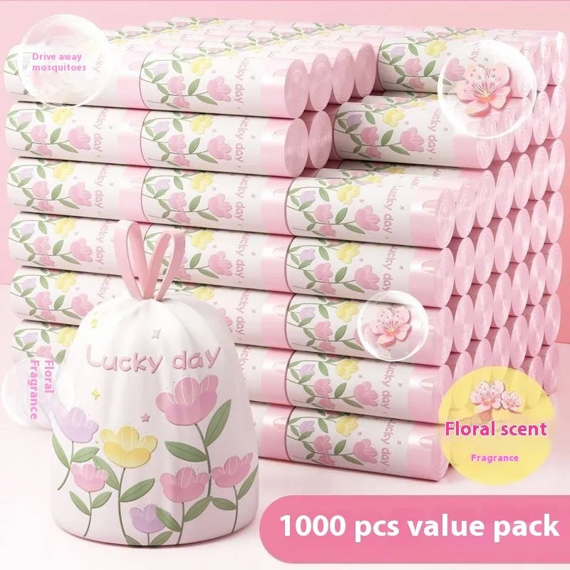 Pink drawstring degradable garbage bags with wormwood, shown in a pack, dimensions 44cm by 48cm.