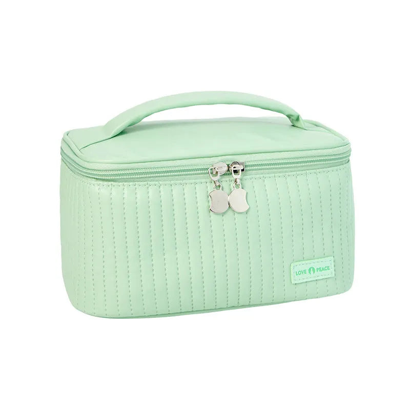 Open-top women's makeup bag in PU leather, shown in a choice of solid colours including pink, beige, and light blue.