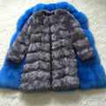 Women's long black artificial fur coat with regular sleeves on a hanger.