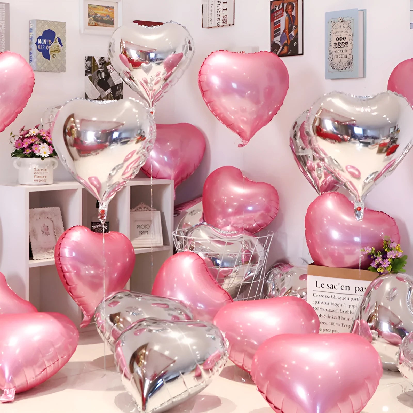 Set of five shiny metallic peach heart-shaped aluminium balloons in rose red colour.