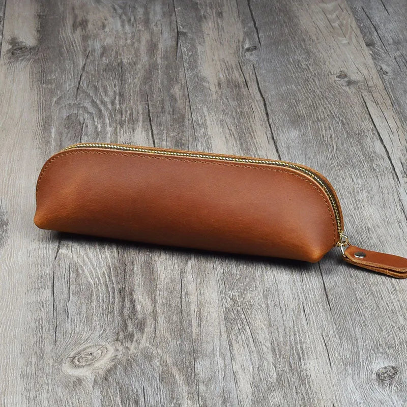 Square leather pencil case with zip closure in black colour showing 18cm dimensions