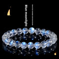 Natural cream coloured Blue Moonlight crystal bracelet on a wrist, showing minimalist unisex design.