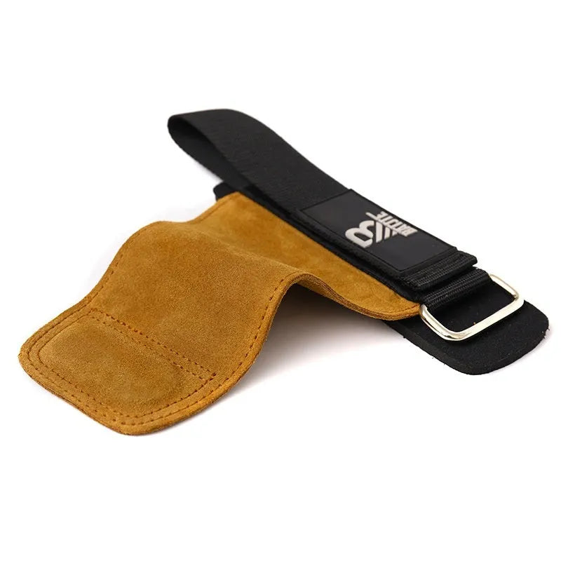 A pair of brown full-grain leather wrist support bands with hook-and-loop fasteners, laid flat.