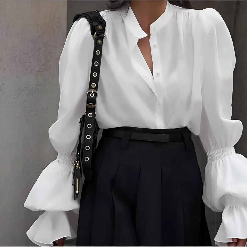 Women's polyester shirt with lantern sleeves, ruffle detail, round neck, single-breasted front, in white, pink, or black.