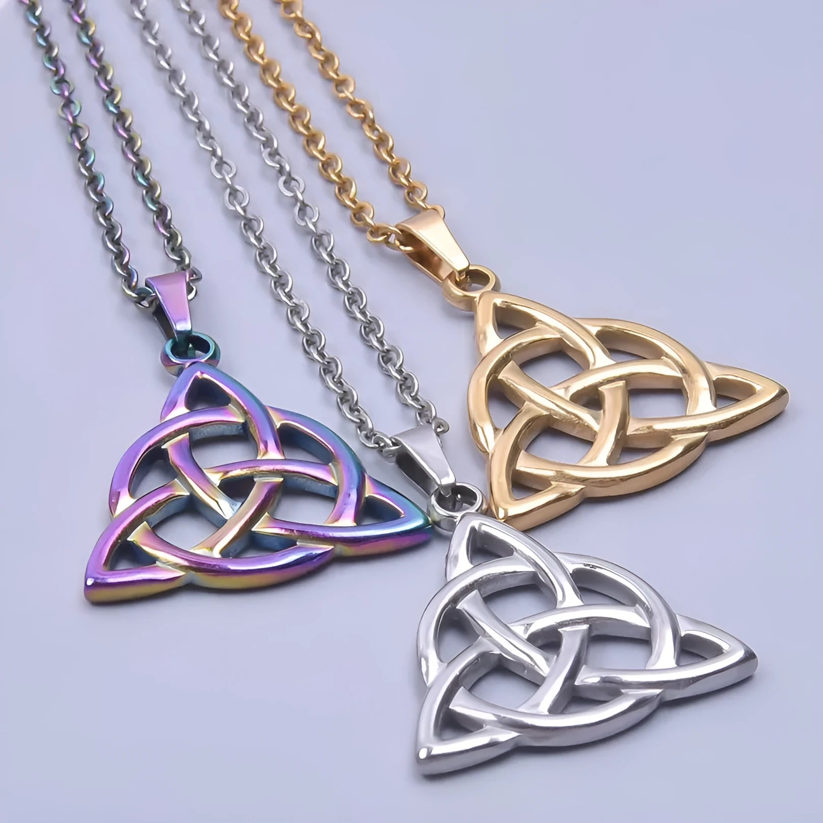 Stainless steel wave-shaped pendant necklace with Eight Awn star motif, electroplated steel colour finish