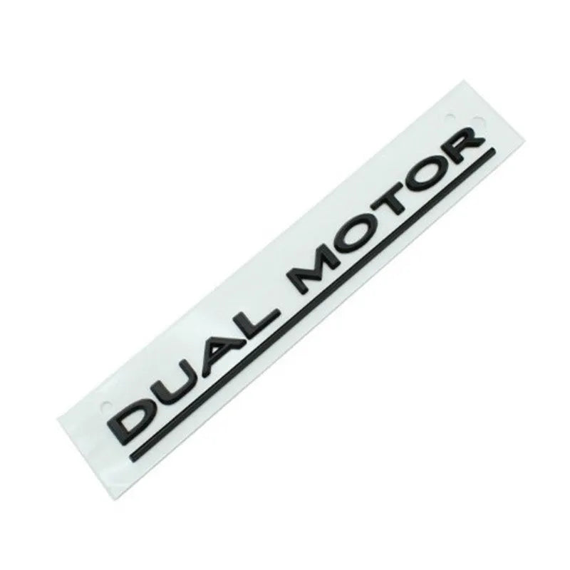 Tesla Model 3 rear bumper sticker in ABS plastic, showing matte black and silver colour options.