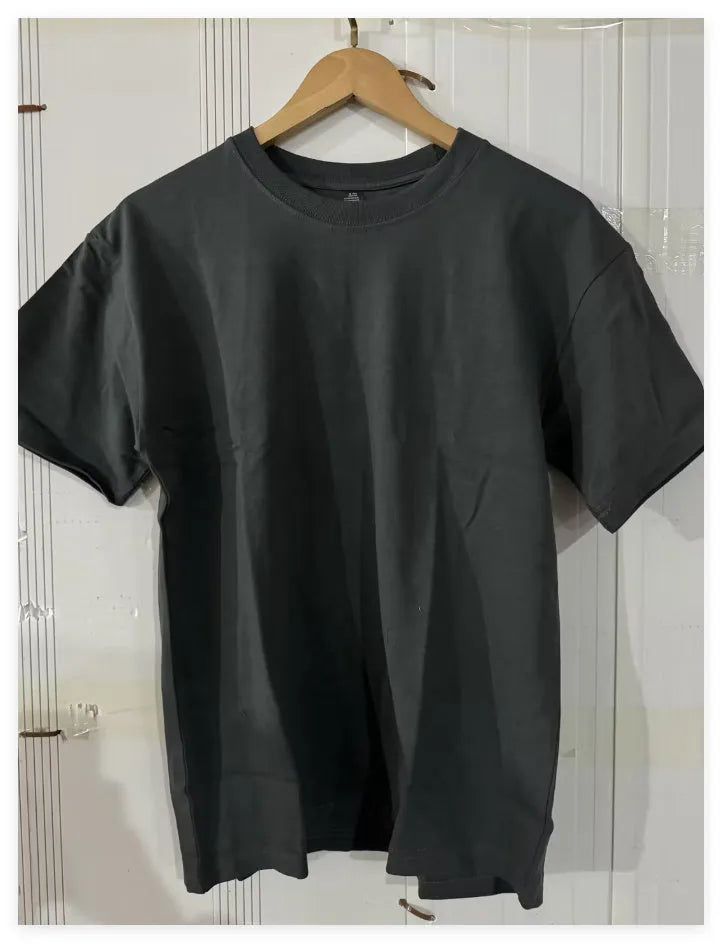 Plus size men's oversized solid colour cotton T-shirt in Ivory White with loose fit and short sleeves