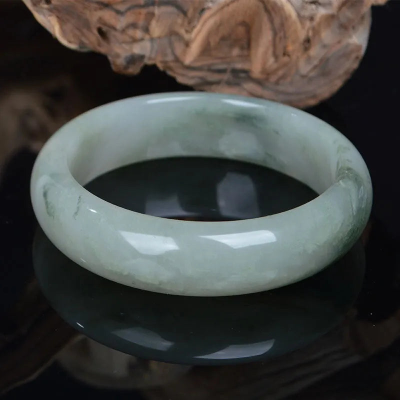 Natural Jinsi Jade Chinese style bracelet showing traditional design with six size options from 52mm to 62mm inner diameter