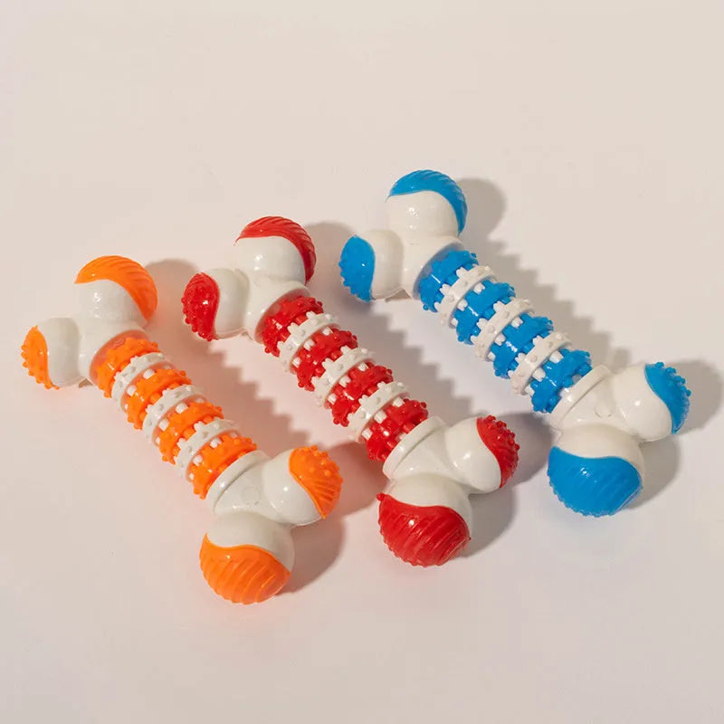 Blue, orange, and red bone-shaped interactive chew toy with treat holder for small breed dogs.