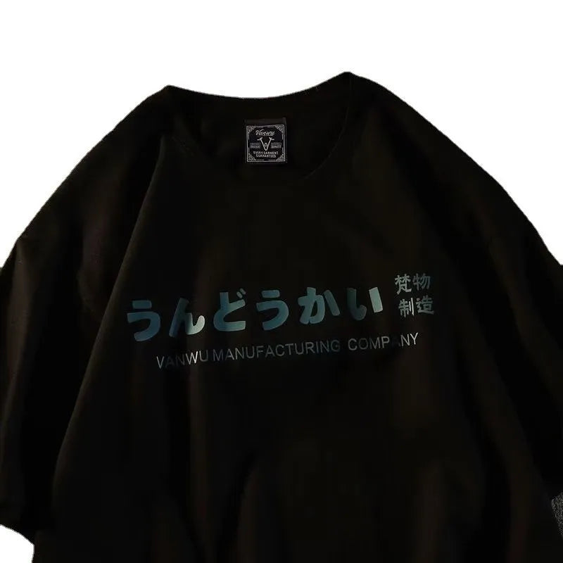 Loose fit pure cotton short sleeve t-shirt in black, shown on a hanger.