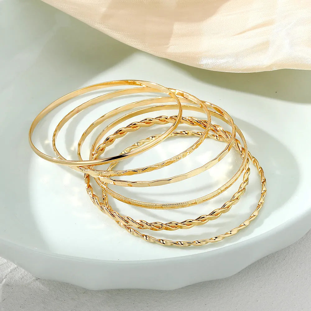 Gold tone bohemian metal chain bracelet set for women with geometric links and musical note bangles