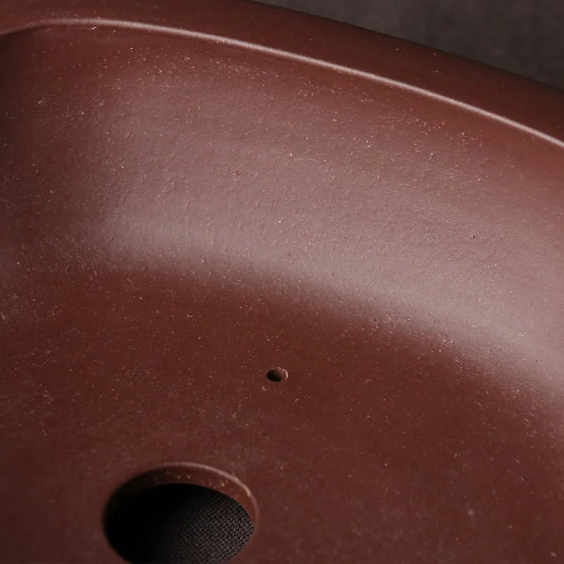 Handmade rectangular purple clay bonsai pot in a classical plain Chinese style.