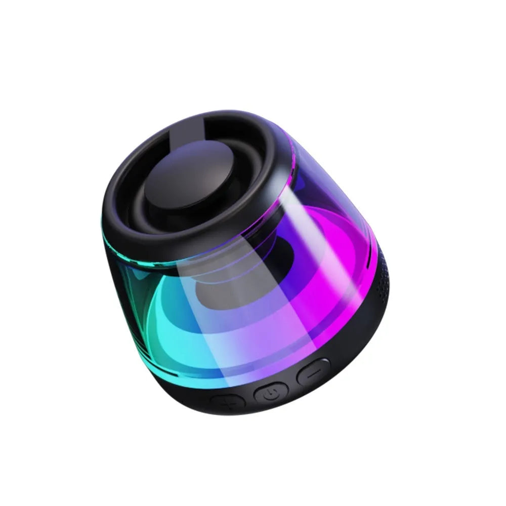 Small round portable wireless Bluetooth speaker with mood lighting in black or white colour, showing magnetic base.