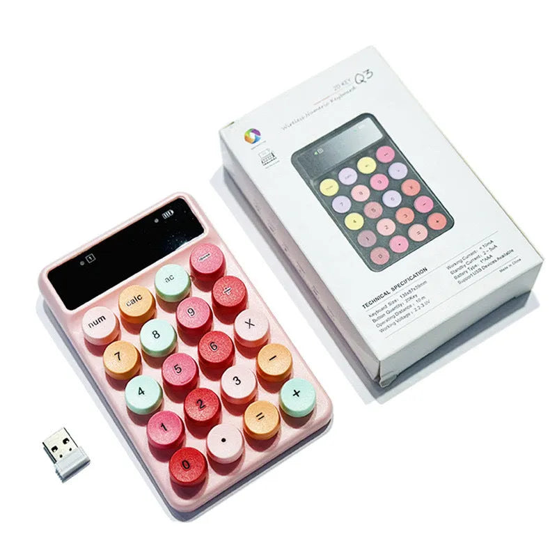 Q3 mini wireless keyboard in macaron colours on desk