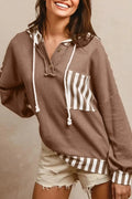Straw yellow women's hoodie with waffle texture, patchwork stripes, button neck, and drawstring hood.