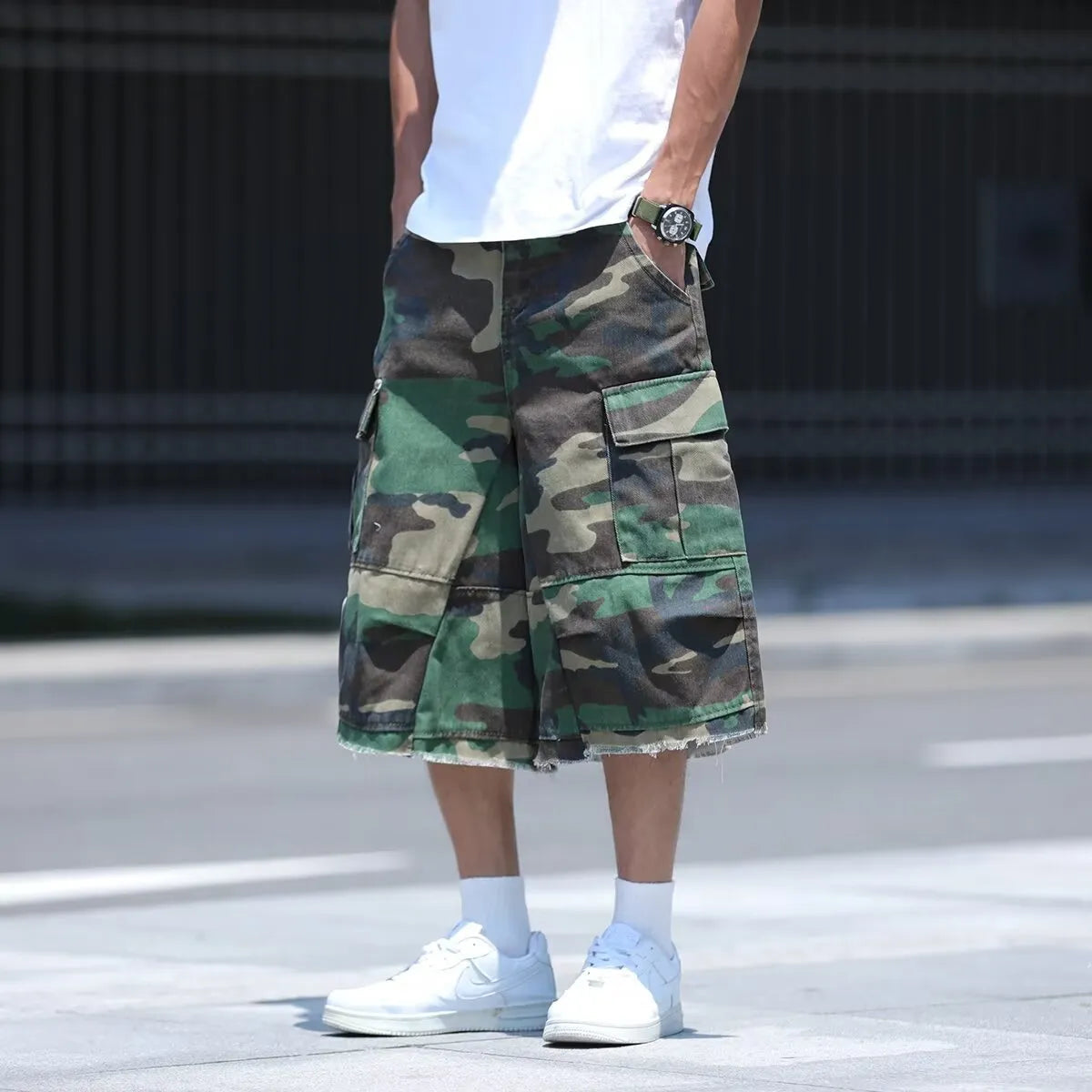 American retro workwear shorts in camouflage pattern with cotton construction and loose fit design
