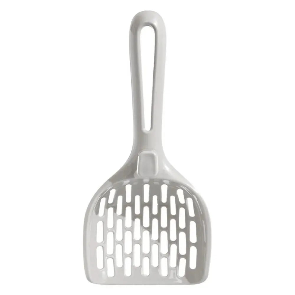 Grey plastic cat litter scoop resting in its matching plastic storage base