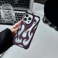 Electroplated hollow flame pattern phone case for iPhone, showing silver finish and perforated design for heat dissipation.