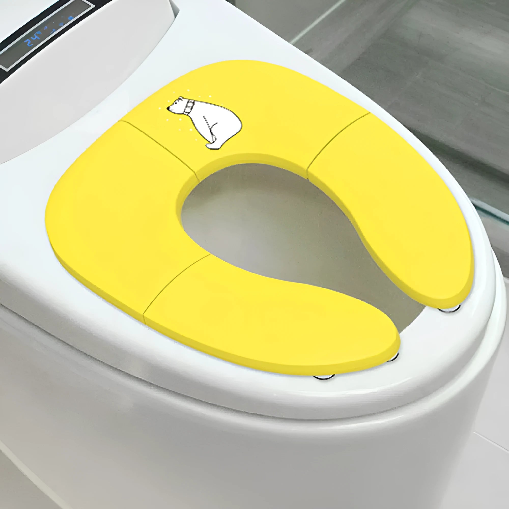 Foldable baby travel potty seat in blue with splash guard, shown folded and open on a white background