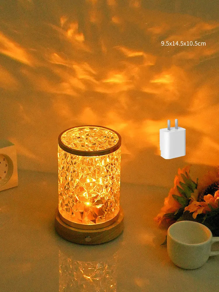 Rotating water ripple night light on solid wood base with USB charging cable