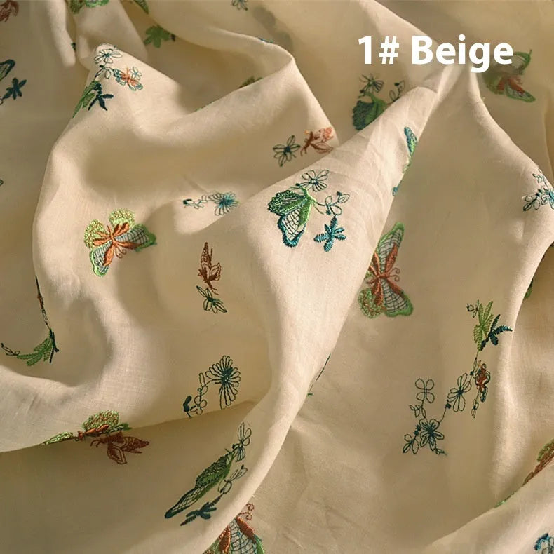 Pure ramie embroidery cloth hanfu fabric in beige, dark green, or grass green, showing texture.