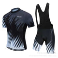 Unisex blue and black cycling jersey and pants set on a white background.
