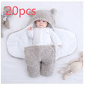 Cotton blend baby quilted sleeping bag wrapper shown in light blue, with size and colour options displayed.