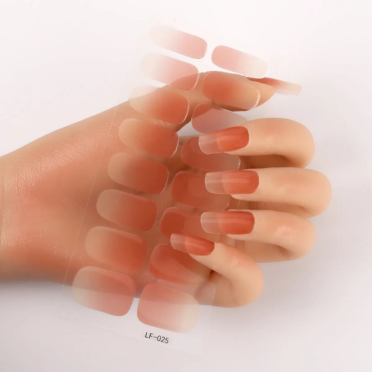 16 solid colour full nail art stickers with 22 patterns including cross, rose, butterfly designs in 12x6mm oval size