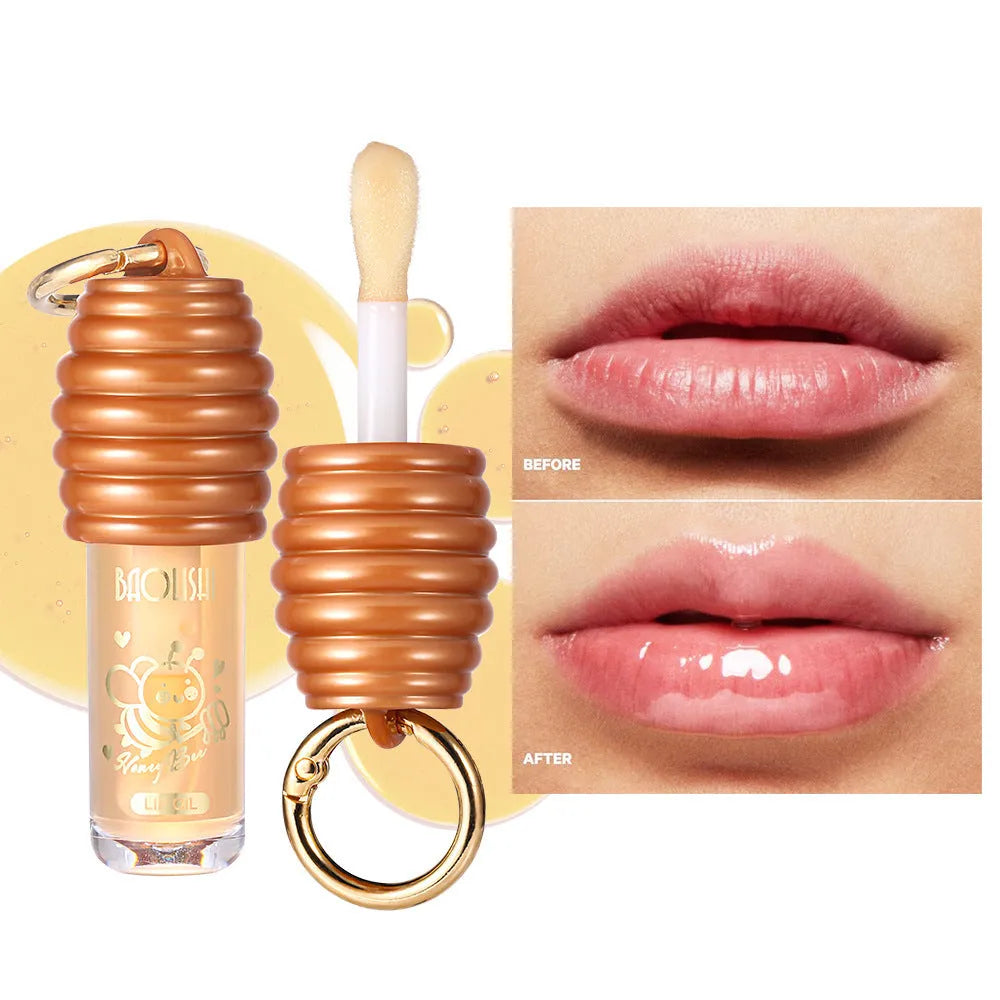 Honey Lip Gloss attached to a keychain for portable lip moisturising