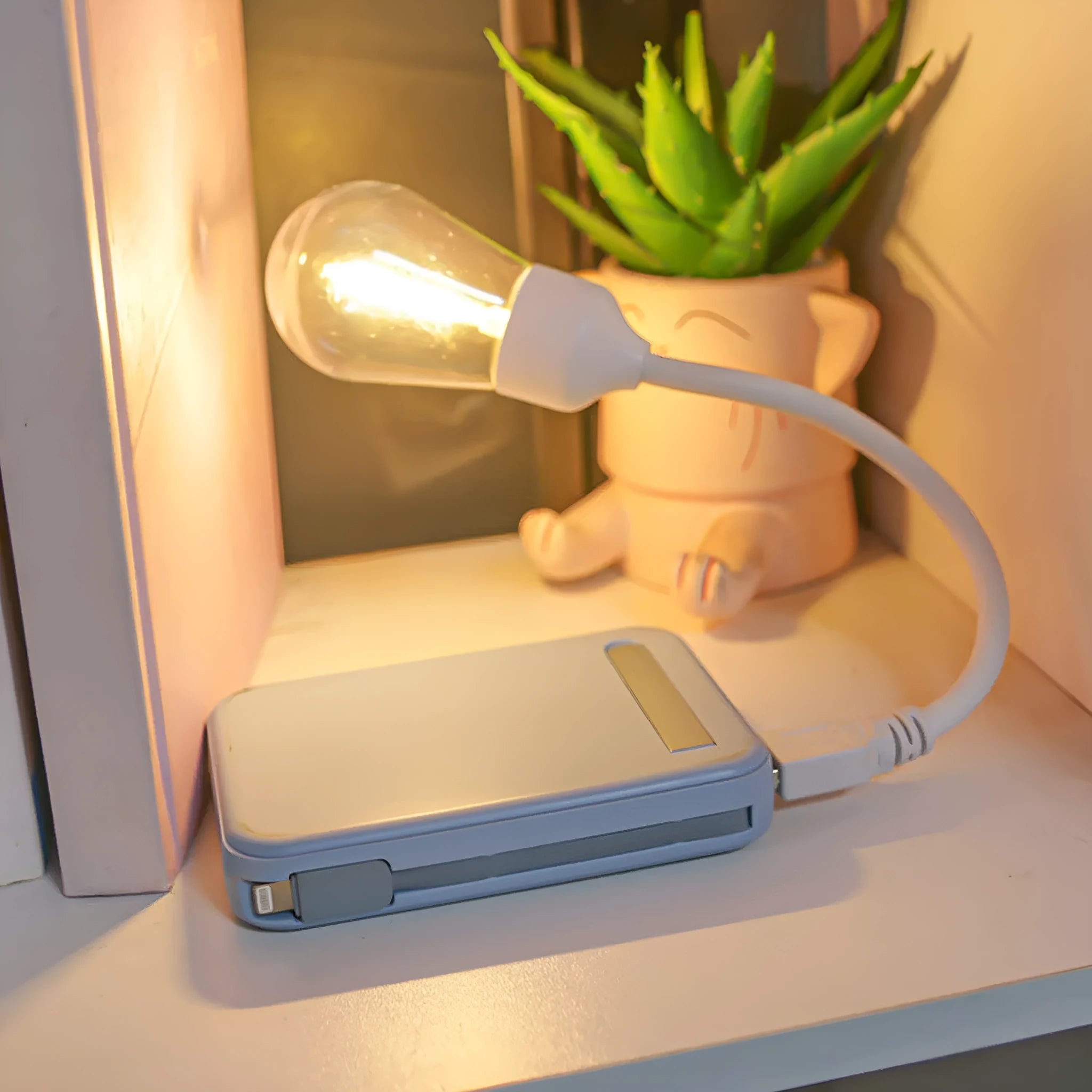 USB rechargeable folding tungsten night light showing warm white illumination