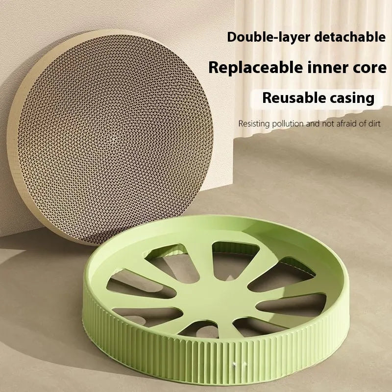 Green and white round cat scratching board measuring 55 cm with two spare corrugated paper refills
