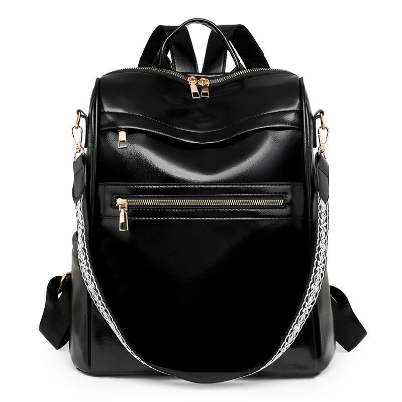 Retro PU backpack in black with multiple compartments, waterproof and wear-resistant, for daily use.