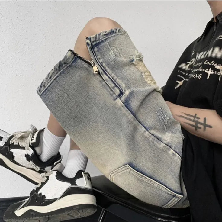 Blue retro style wide leg denim shorts with tattered detailing and loose fit