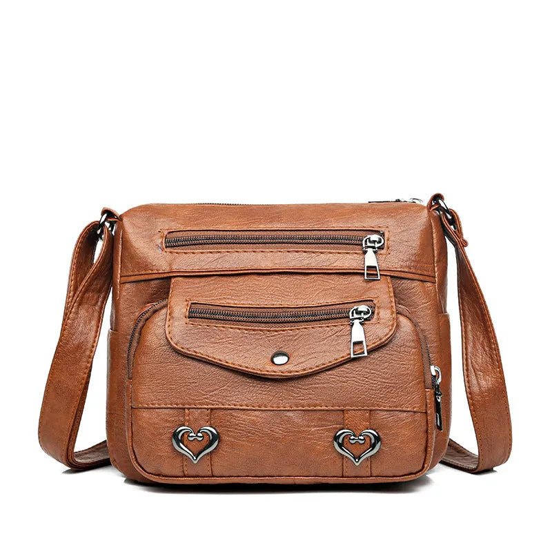 Soft PU crossbody shoulder bag with multi-pocket design in urban simplicity style, available in brown colour