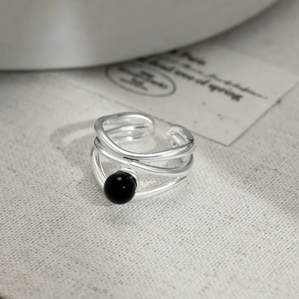 S925 sterling silver ring with black agate inlay adjustable opening geometric hollow design for women