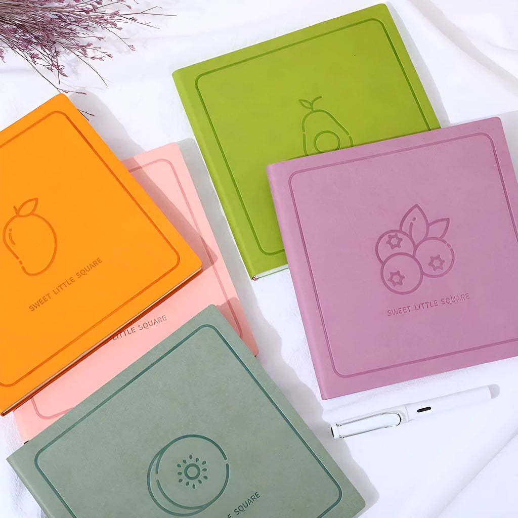 Square notebook with textured faux leather mesh cover in multiple colour options showing three interior format choices
