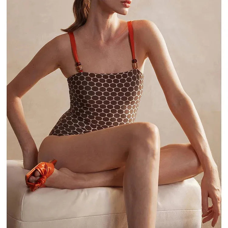 Women's dot pattern one-piece swimsuit with matching wrap skirt set